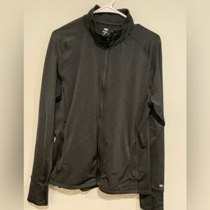 Black Legend zipped activewear jacket with pockets and thumb holes. Size…